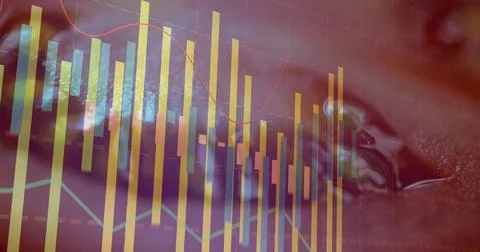 Displaying market chart overlay on macro surface, with yellow teal candles, red Stock Photos