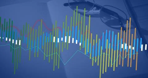 Displaying multicolored data visualization overlay on wooden desk, with open 스톡 사진