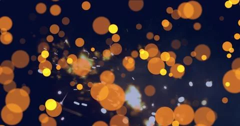 Displaying overlapping orange-yellow bokeh circles over navy backdrop, with Stock Photos