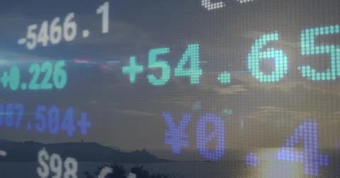 Displaying pixelated financial data over dusk hillside silhouette with currency Stock Photos