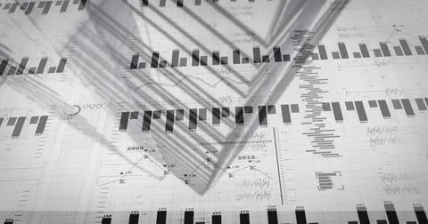 Displaying printed analytics sheet lying on office desk, showing bar charts,  스톡 사진