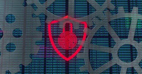 Displaying red shield icon with padlock fingerprint protecting code streams on 写真素材