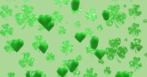 Displaying repeating pattern covering pale green field, with sparkly shamrocks Stock Photos