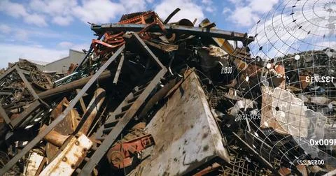 Displaying rusted scrap heap piling in outdoor scrapyard with globe overlay and Stock Photos