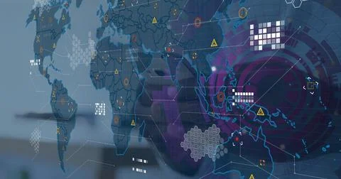 Displaying semi-transparent world map floating over office desk, with hexagonal Stock Photos