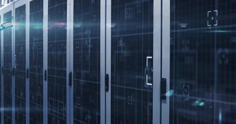 Displaying server cabinets receding through data center corridor, with blinking Foto stock