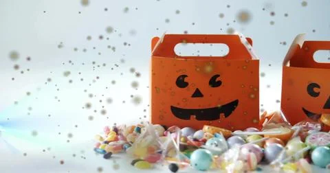 Displaying single orange jack-o-lantern box sitting right of center on white Stock Photos