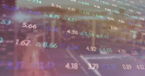 Displaying stock data overlay over blurred urban street, showing digital numbers Stock Photos