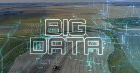 Displaying stylized BIG DATA text overlaying farmland, with tractor and circuit Stockfoto's