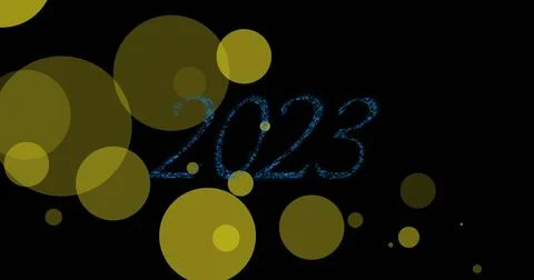 Displaying stylized blue glitter 2023 overlapping translucent yellow circles on 写真素材