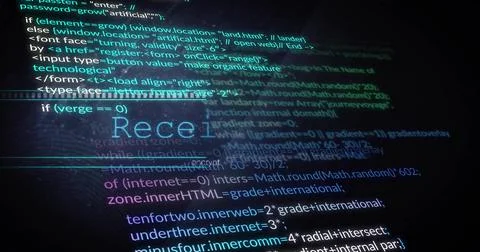 Displaying syntax-highlighted code editor on office desk, with computer monitor Stockfoto's