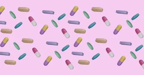 Displaying tiled pattern of pills and capsules on pastel pink studio, featuring Stock Photos