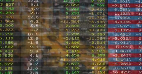 Displaying translucent digital financial panel showing colored figures in Stock Photos