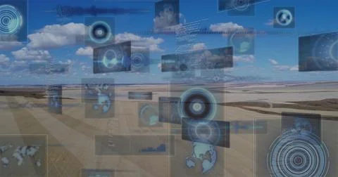 Displaying translucent HUD panels over plowed fields under blue sky with charts Foto stock