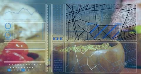 Displaying translucent HUD spanning tabletop at kitchen, showing charts, maps, Stock Photos