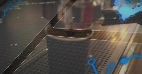 Displaying transparent panels over perforated metal console, showing blue node Stock Photos