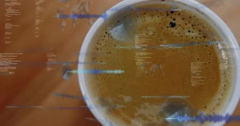 Displaying white ceramic cup of espresso on warm wooden tabletop, showing crema, Foto stock
