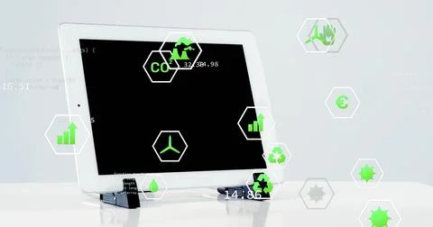 Displaying white tablet computer resting on stand at studio table, with floating Stock Photos
