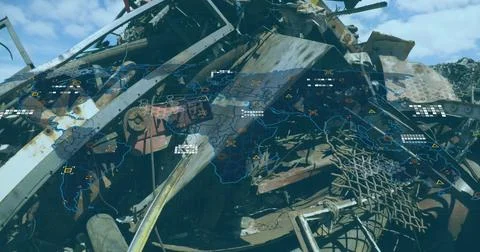 Displaying world map overlay over scrapyard heap, with rusted beams and pipes Stock Photos
