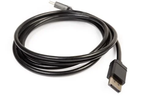 DisplayPort cable with full-size connectors closeup in selective focus Фото