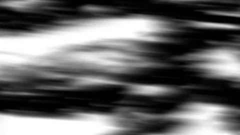 Displays an abstract blur of light and dark shades. Video stock 320230924