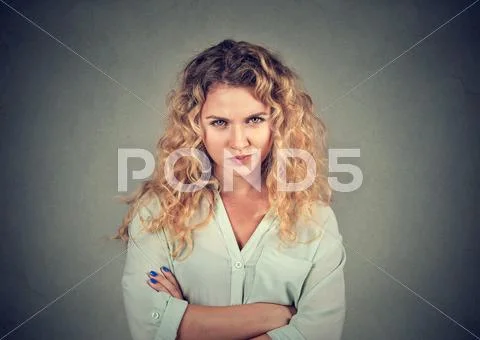 Displeased pissed off angry grumpy pessimistic woman with bad attitude Stock Photos