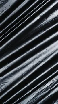 Disposable black garbage bag texture 스톡 사진