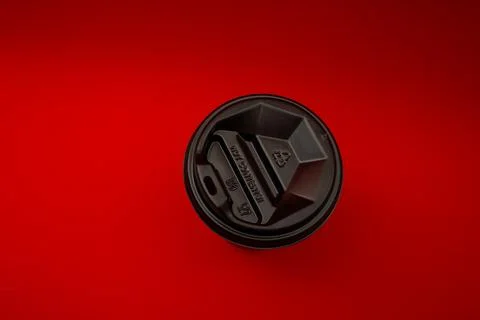 Disposable coffee cup with plastic lid Stock Photos