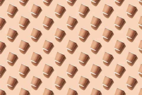 Disposable cups on beige background. Zero waste seamless pattern. Pollution e Stock Photos