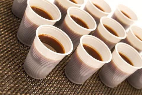 Disposable cups with coffee Foto stock
