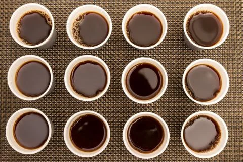 Disposable cups with coffee Stock Photos