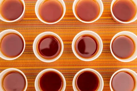 Disposable cups with tea Stock Photos