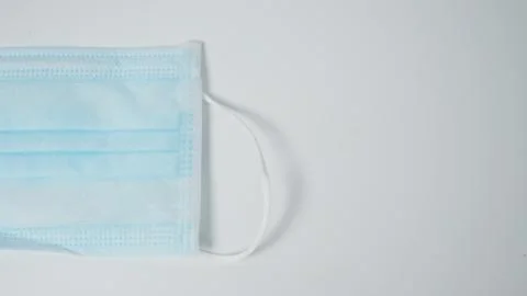 Disposable Ear- loop face mask on white background. Stock Photos