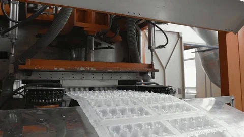 Disposable food package ware manufacturing plant, eggs container production line Stock Footage 101864725