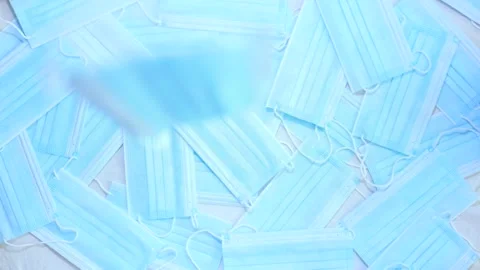 Disposable mask's falling in slowmotion. (05)
FULLHD Stock Footage 139646442