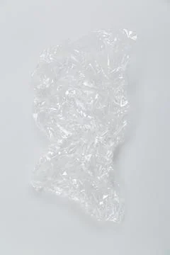 Disposable plastic bag on grey background. Space for your text Foto stock