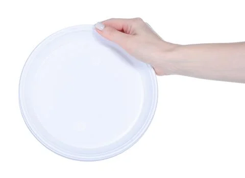 Disposable plastic dishes in hand Stock Photos