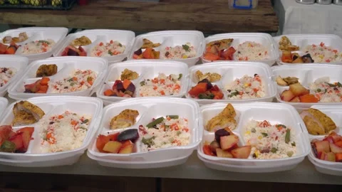 Disposable plastic lunch boxes with takeaway hot meals. Prepared meal delivery Stock Footage 159058632