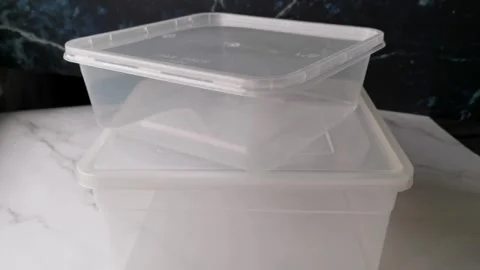 Disposable Plastic Storage or Containers on White Background Stock Footage 240903052