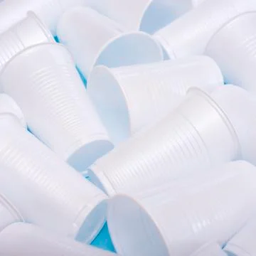 Disposable plastic white empty cups Stock Photos