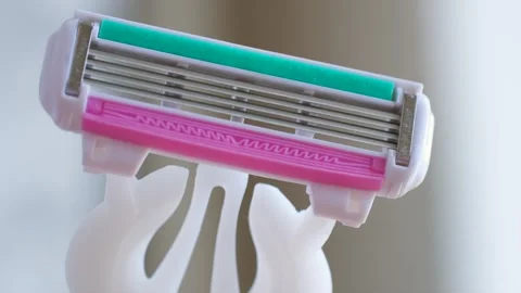 Disposable razor moving sideways during presentation Stock Footage 278466482
