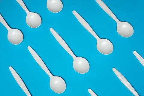 Disposable spoons of corn starch. biodegradable disposable tableware. Stock Photos