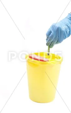 Disposable syringe in container Stock Photos