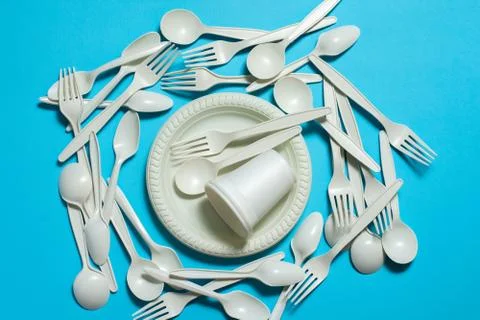 Disposable tableware: forks, spoons, plates and glasses made of cornstarch Stock Photos