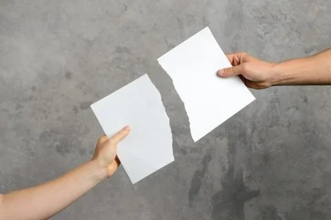 Disrupted blank in two hands Stock Photos