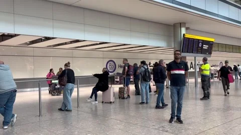 Disrupted passengers at Heathrow after flights cancelled due to Nats technical  Stock Footage 344995447