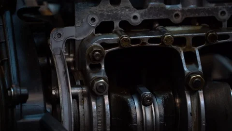 Dissassembled engine parts - bottom end with no oil pan installed, cranks Stock Footage 99255463