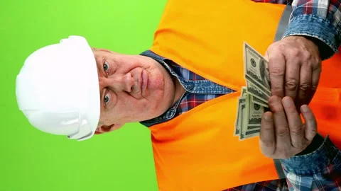 Dissatisfied builder counts money for works and and wants more to be added. Stock Footage 252293407
