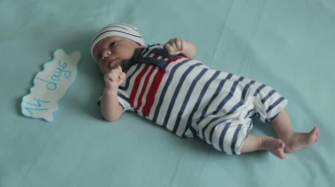 A dissatisfied little guy lying on his back Stock Footage 67520745