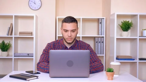 Dissatisfied man looking at the camera Stock Footage 86425861